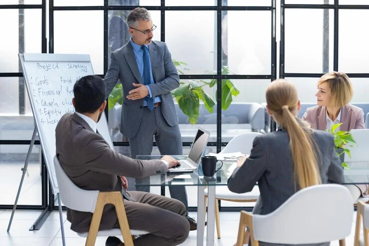 business-conference-presentation-with-team-training-flipchart-office_484651-18809